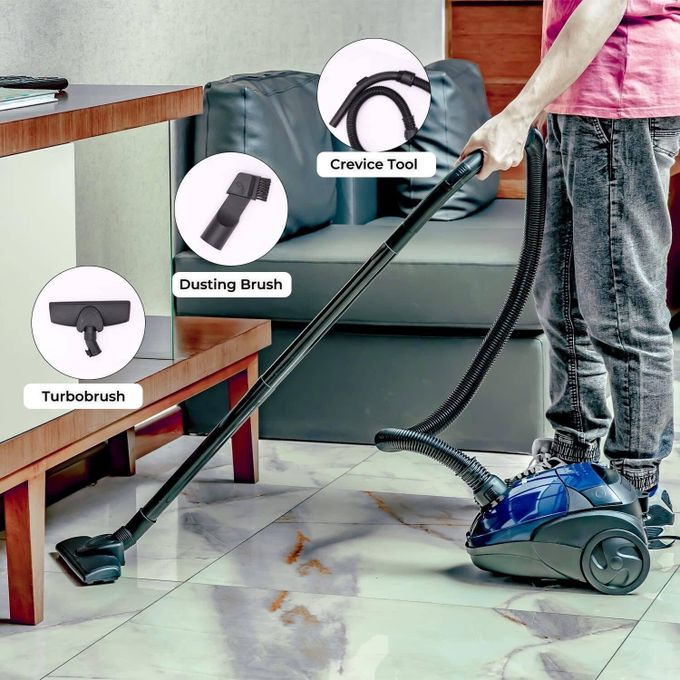 Geepas Vacuum Cleaner Handheld & Stick, 1.5L Dust Bag Capacity,Powerful Motor Comfortable Handle, Rolling wheels with Easy Parking Nozzle and Dust Full Indicator