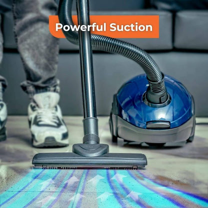 Geepas Vacuum Cleaner Handheld & Stick, 1.5L Dust Bag Capacity,Powerful Motor Comfortable Handle, Rolling wheels with Easy Parking Nozzle and Dust Full Indicator